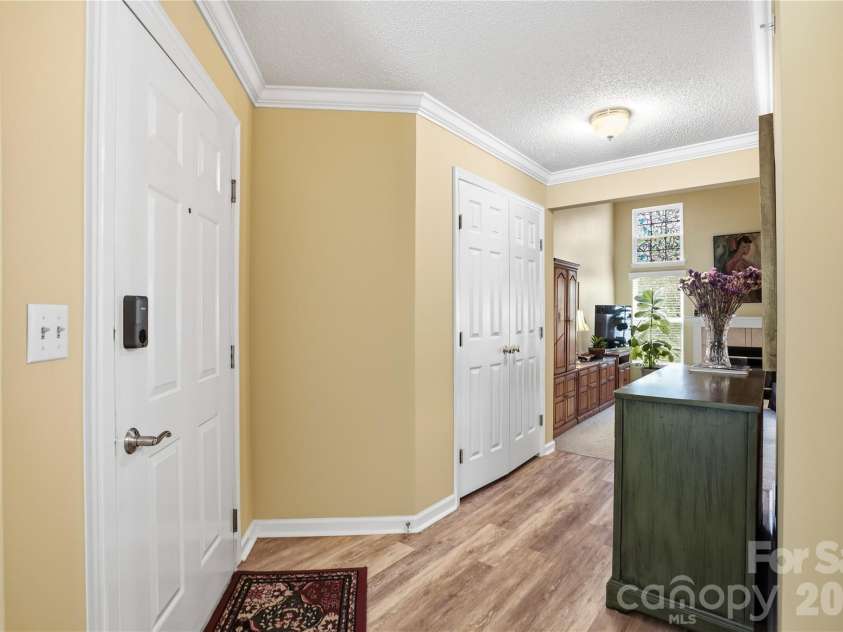 19823 Henderson Road, Cornelius, NC 28031.  MLS# CAR4377209, YatesRealty ID 22560. Beautiful floors in entry