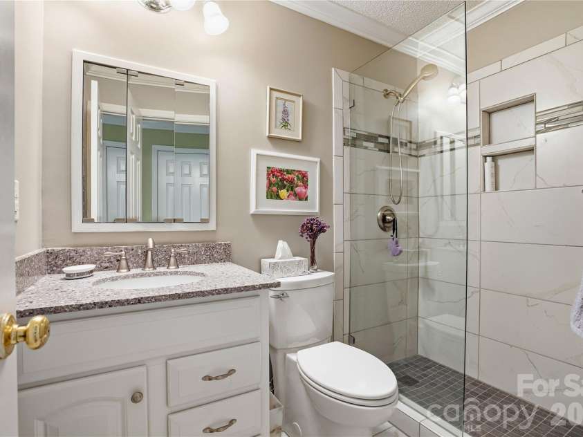 19823 Henderson Road, Cornelius, NC 28031.  MLS# CAR4377209, YatesRealty ID 22560. Beautifully updated primary bath