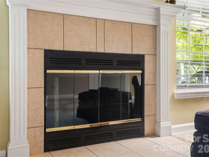 19823 Henderson Road, Cornelius, NC 28031.  MLS# CAR4377209, YatesRealty ID 22560. Gas fireplace