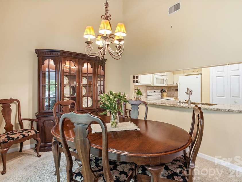 19823 Henderson Road, Cornelius, NC 28031.  MLS# CAR4377209, YatesRealty ID 22560. Spacious dining area
