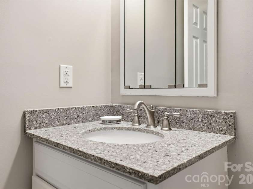 19823 Henderson Road, Cornelius, NC 28031.  MLS# CAR4377209, YatesRealty ID 22560. Updated secondary bathroom
