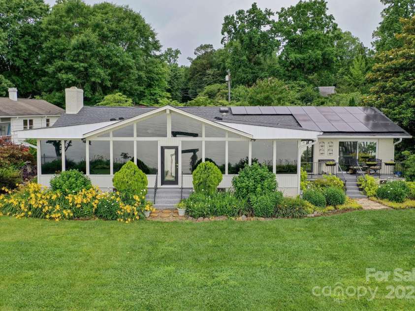 7945 Placid Court, Denver, NC 28037.  MLS# CAR4269290, YatesRealty ID 22561. Aerial view of the back of the home highlighting solar panels that will help keep your bills at a minimum.  Panels are already paid for by sellers.