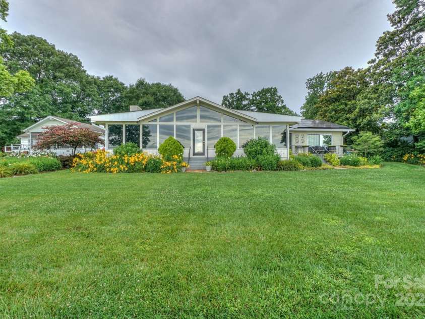 7945 Placid Court, Denver, NC 28037.  MLS# CAR4269290, YatesRealty ID 22561. Flat Back yard view w/ lots of room to entertain at the Lake