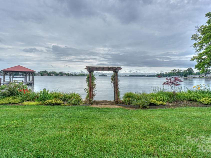7945 Placid Court, Denver, NC 28037.  MLS# CAR4269290, YatesRealty ID 22561. Look at these views and walk to your updated private dock with covered slip and a lift.
