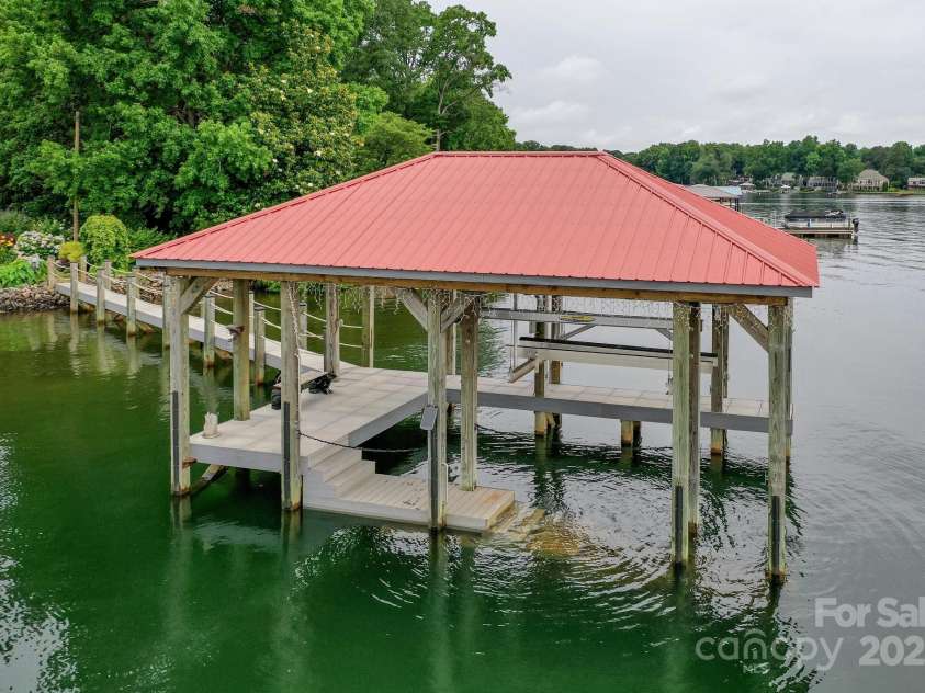 7945 Placid Court, Denver, NC 28037.  MLS# CAR4269290, YatesRealty ID 22561. Newly redone private dock and pier with steps into the water for when the water recedes to summer levels.