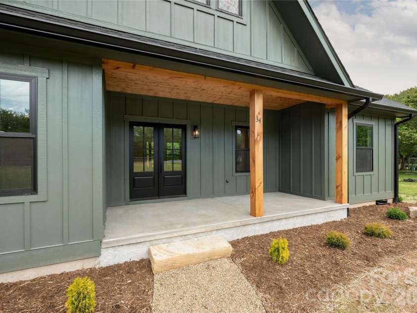 34 Old Souther Road, Mills River, NC 28759.  MLS# CAR4380756, YatesRealty ID 22562. Covered front porch