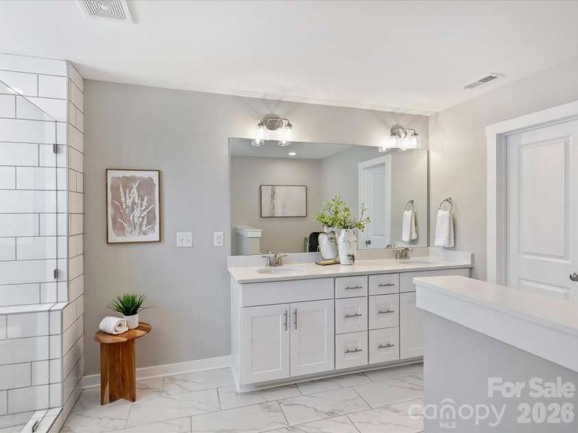 111 Cranford Drive, Pineville, NC 28134.  MLS# CAR4381418, YatesRealty ID 22566. Primary bathroom