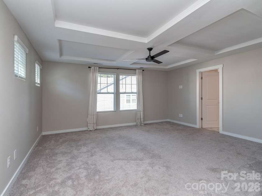 111 Cranford Drive, Pineville, NC 28134.  MLS# CAR4429371, YatesRealty ID 22566. Primary suite with coffered ceilings