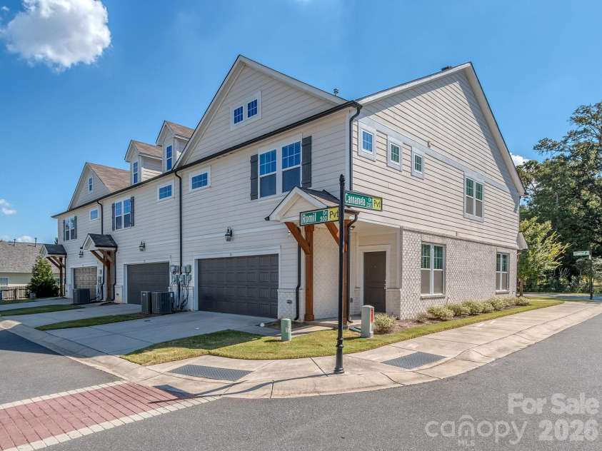 111 Cranford Drive, Pineville, NC 28134.  MLS# CAR4429371, YatesRealty ID 22566. Rear load two car garage with additional parking