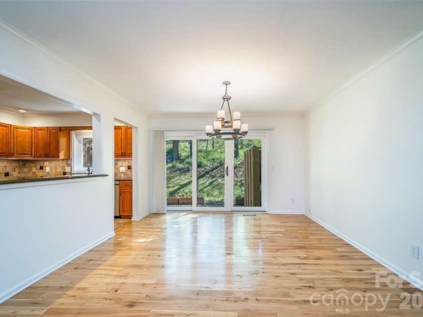 12 Pebble Creek Drive, Asheville, NC 28803.  MLS# CAR4382376, YatesRealty ID 22567. Dining area with Kitchen Pass Through