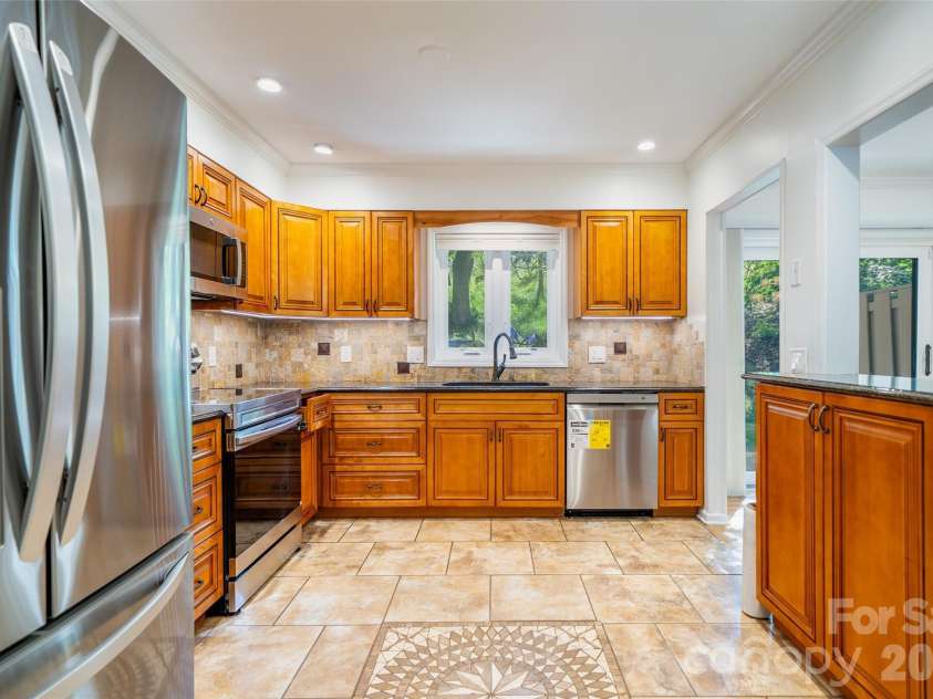 12 Pebble Creek Drive, Asheville, NC 28803.  MLS# CAR4382376, YatesRealty ID 22567. Kitchen Angle 2