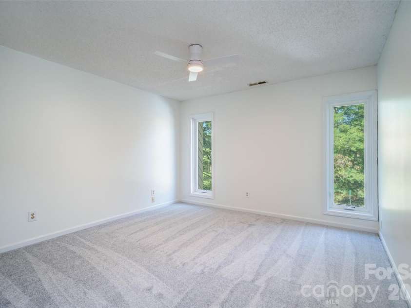 12 Pebble Creek Drive, Asheville, NC 28803.  MLS# CAR4382376, YatesRealty ID 22567. Second Bedroom Angle 1