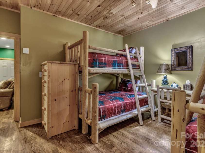432 Atlantic Falls Trail, Black Mountain, NC 28711.  MLS# CAR4206241, YatesRealty ID 2257. Lower Level bunkroom (house has a 3 bedroom septic, this room is not counted as a bedroom).