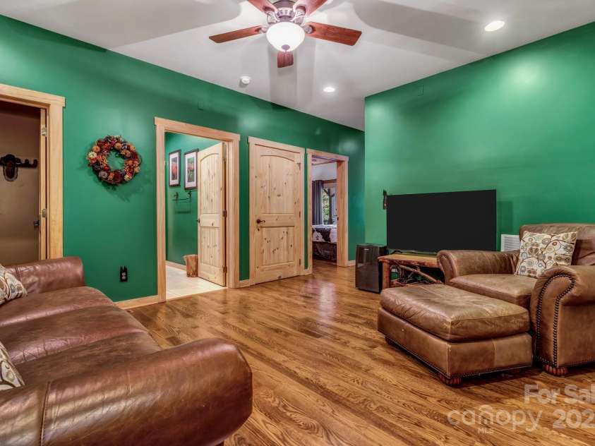 432 Atlantic Falls Trail, Black Mountain, NC 28711.  MLS# CAR4206241, YatesRealty ID 2257. Lower level gathering room