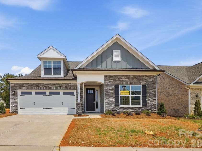 3050 Constitution Lane, Gastonia, NC 28056.  MLS# CAR4349382, YatesRealty ID 22570. Founders Landing Lot 8 features a Wescott E floorplan