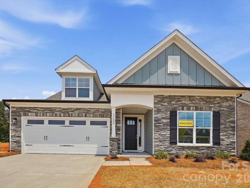 3050 Constitution Lane, Gastonia, NC 28056.  MLS# CAR4349382, YatesRealty ID 22570. Founders Landing Lot 8 features a Wescott E floorplan