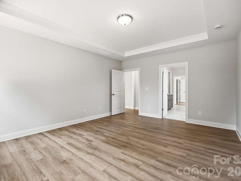 3050 Constitution Lane, Gastonia, NC 28056.  MLS# CAR4349382, YatesRealty ID 22570. Primary Bedroom