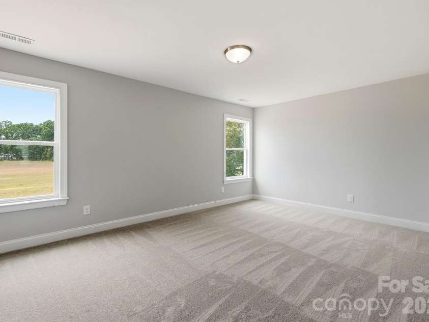 3050 Constitution Lane, Gastonia, NC 28056.  MLS# CAR4349382, YatesRealty ID 22570. Upper-Level Bedroom