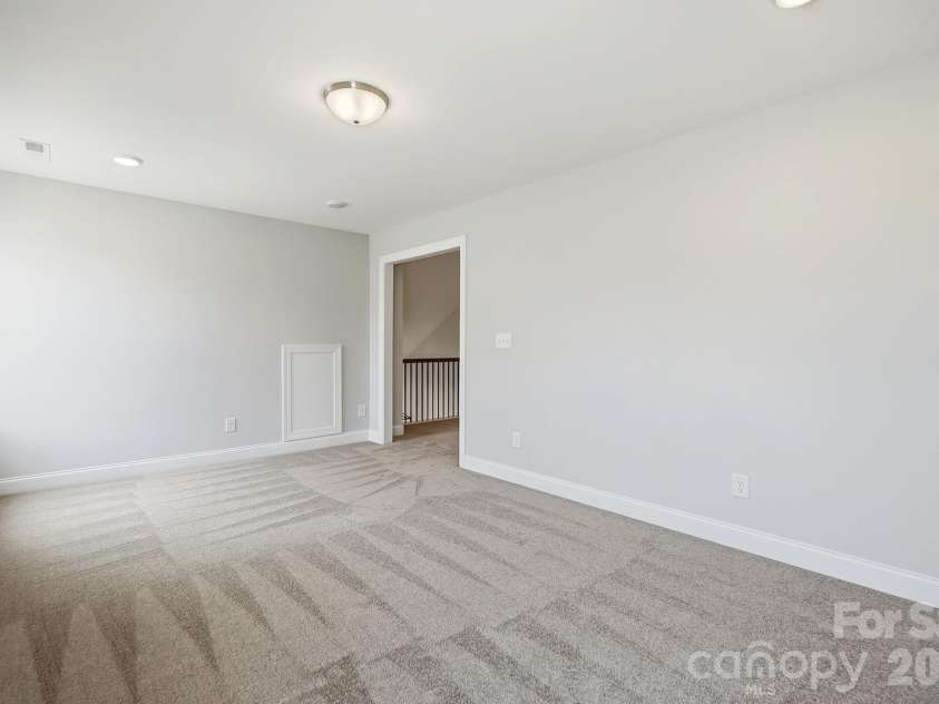 3050 Constitution Lane, Gastonia, NC 28056.  MLS# CAR4349382, YatesRealty ID 22570. Upper-Level Loft
