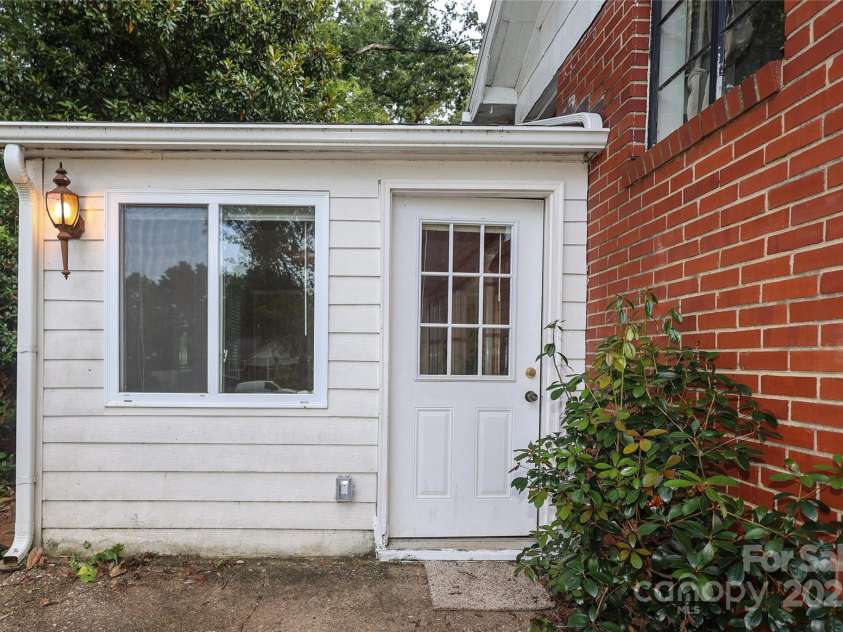 516 Northgate Avenue, Charlotte, NC 28209.  MLS# CAR4245106, YatesRealty ID 22573. Converted carport