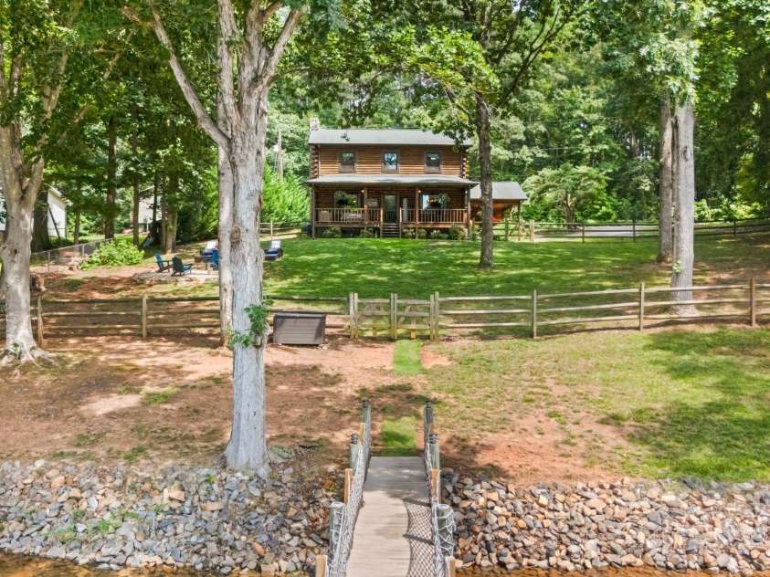 6836 Summer Hill Drive, Denver, NC 28037.  MLS# CAR4271136, YatesRealty ID 22574. Shoreline stabilization with rip rap completed in 2018