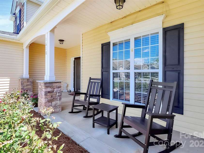 1618 Bay Meadows Avenue, Concord, NC 28027.  MLS# CAR4259621, YatesRealty ID 22575. Rocking Chair Front Porch