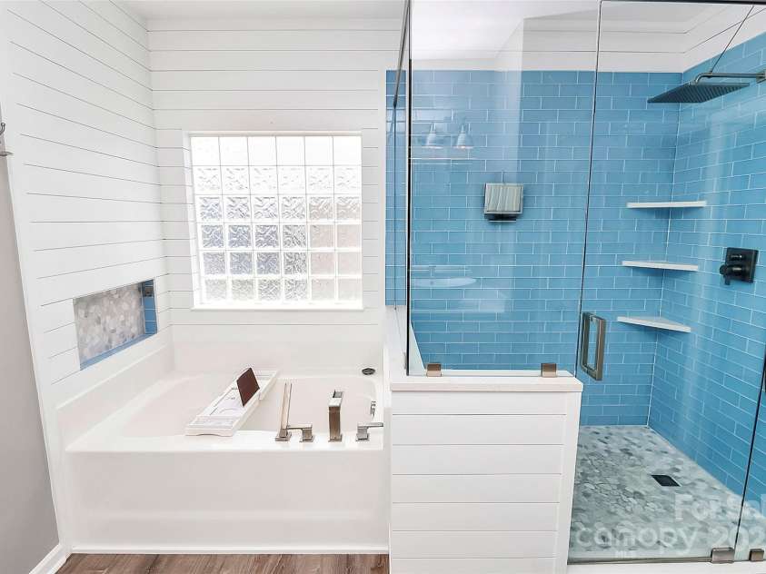1618 Bay Meadows Avenue, Concord, NC 28027.  MLS# CAR4259621, YatesRealty ID 22575. Tub and Frameless Shower