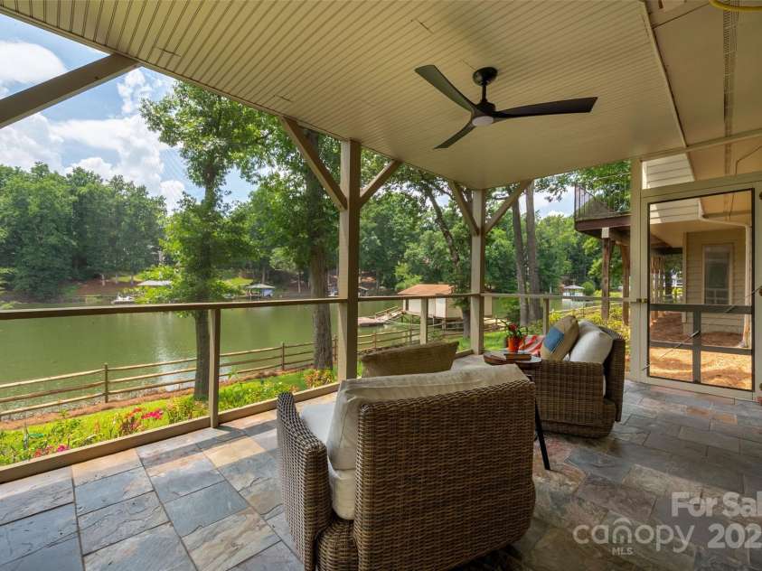 6259 River Cabin Lane, Charlotte, NC 28278.  MLS# CAR4271955, YatesRealty ID 22576. A screened-in porch off rec room provides a serene connection to the outdoors with comfort and privacy!