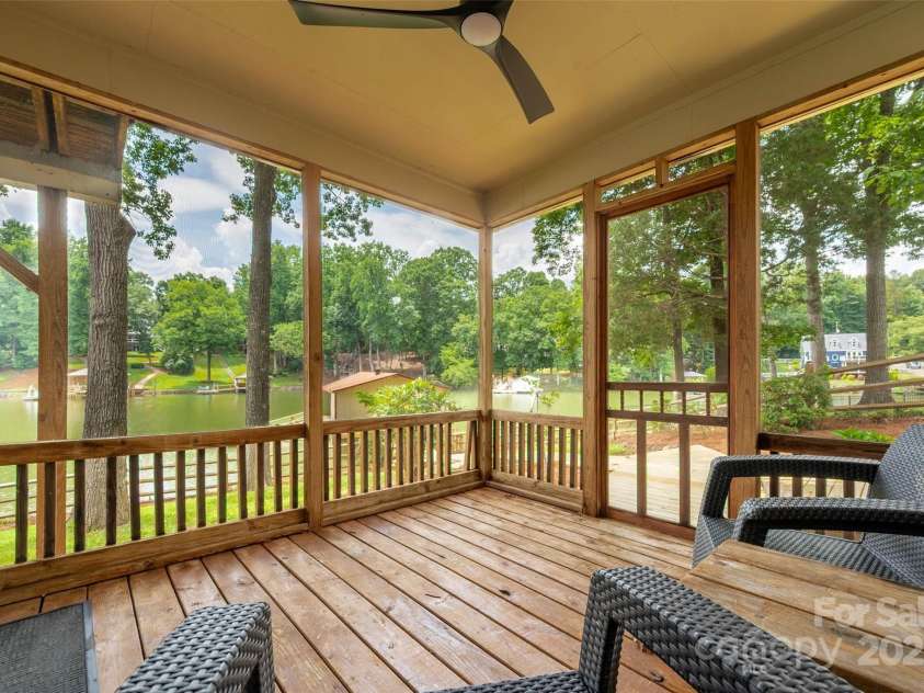 6259 River Cabin Lane, Charlotte, NC 28278.  MLS# CAR4271955, YatesRealty ID 22576. Third screened-in porch located off the basement flex space—plenty of room for everyone to relax and spread out!