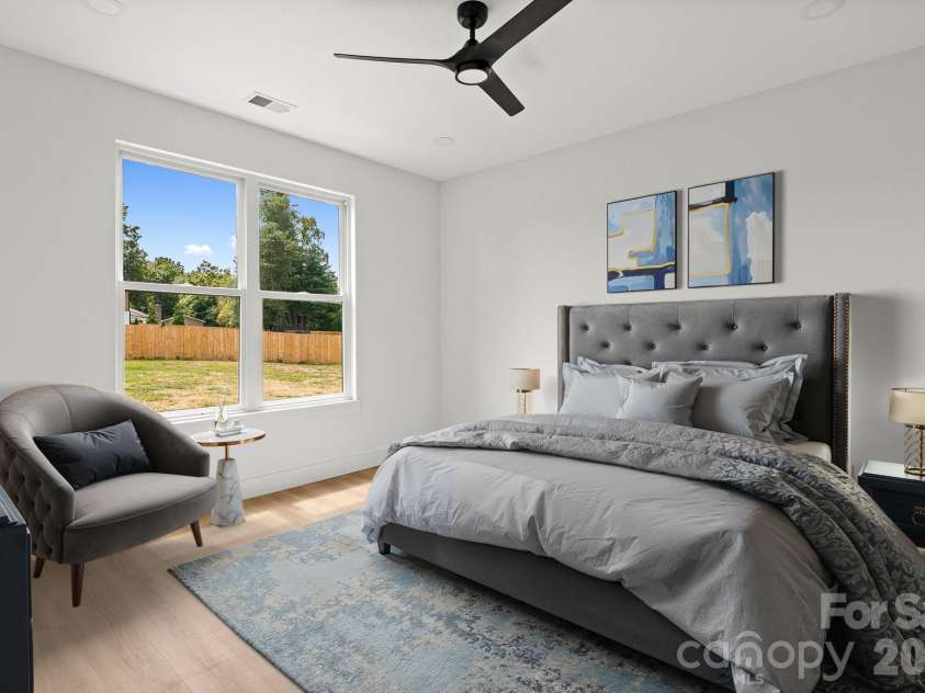 760 New Hope Road, Flat Rock, NC 28731.  MLS# CAR4299455, YatesRealty ID 22578. Virtually staged bedroom