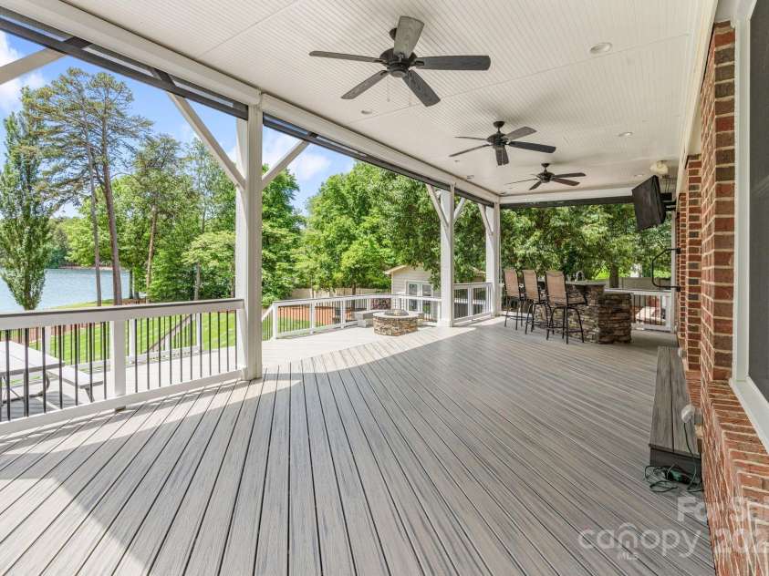 17112 Green Dolphin Lane, Cornelius, NC 28031.  MLS# CAR4251860, YatesRealty ID 22580. Enclose the deck with the automated screens