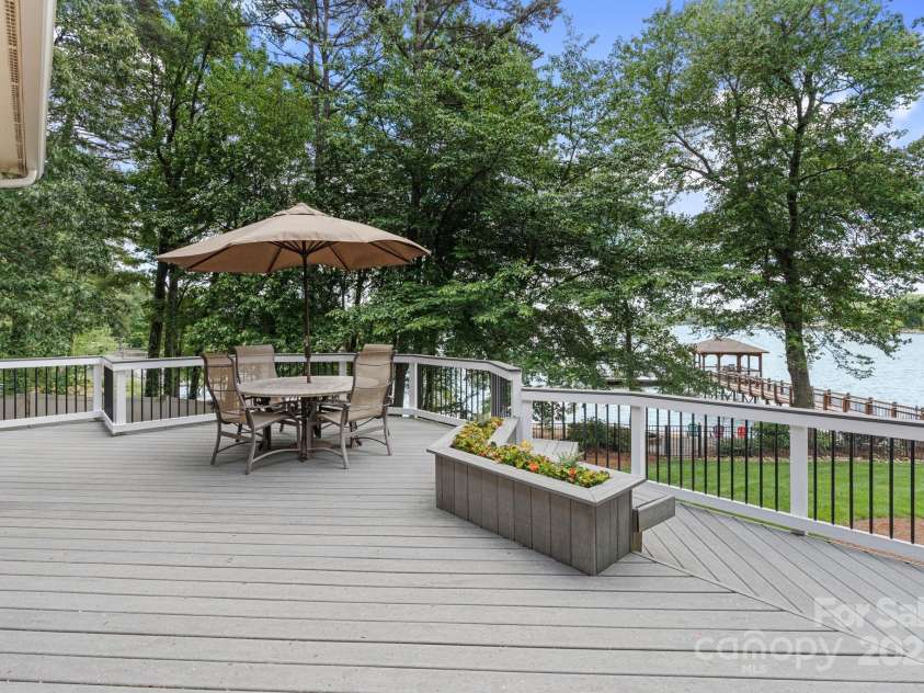 17112 Green Dolphin Lane, Cornelius, NC 28031.  MLS# CAR4251860, YatesRealty ID 22580. Low maintenance Trex decking