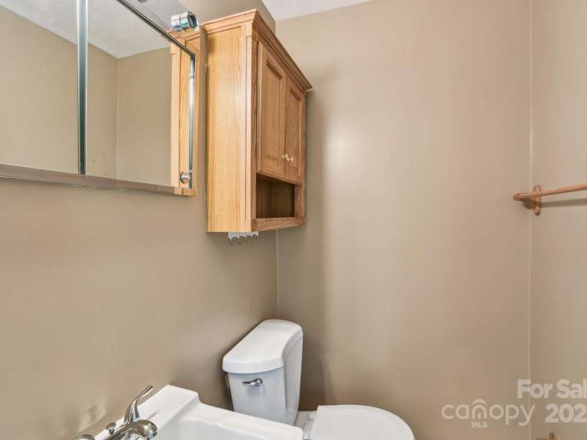 19 Clement Place, Asheville, NC 28805.  MLS# CAR4249307, YatesRealty ID 22582. And features it's own half bath.