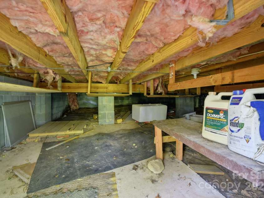 19 Clement Place, Asheville, NC 28805.  MLS# CAR4249307, YatesRealty ID 22582. The crawlspace is well insulated and offers ample room to navigate.