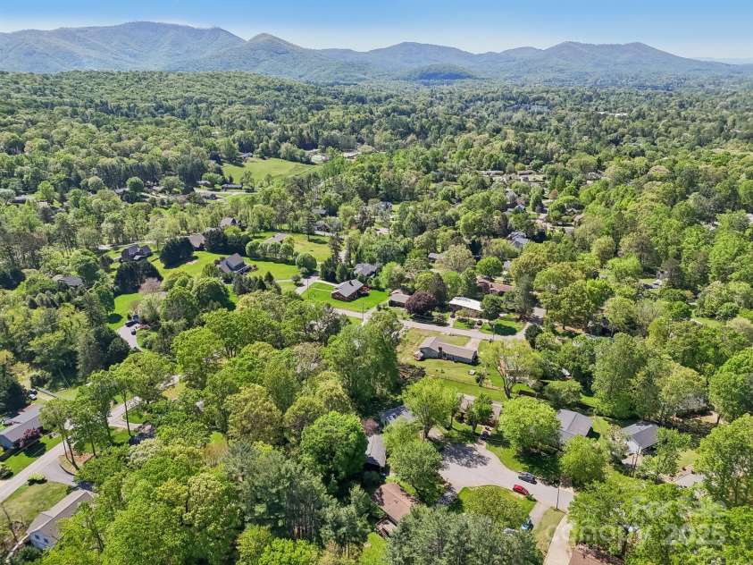 19 Clement Place, Asheville, NC 28805.  MLS# CAR4249307, YatesRealty ID 22582. When standing there, the mountains call to you in the distance.