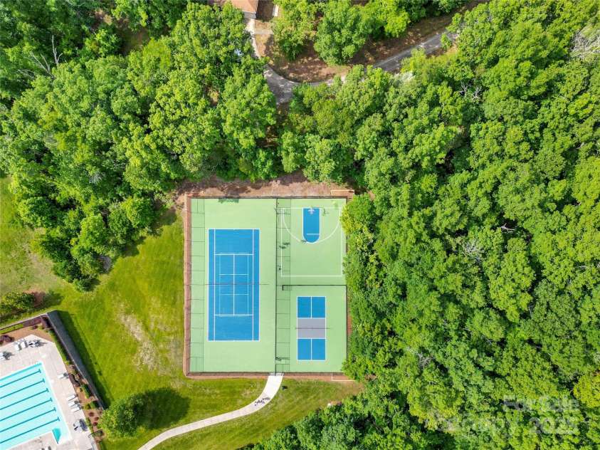 7480 Katelyn Court, Harrisburg, NC 28075.  MLS# CAR4263939, YatesRealty ID 22585. Bridge Pointe Updated Sports Courts