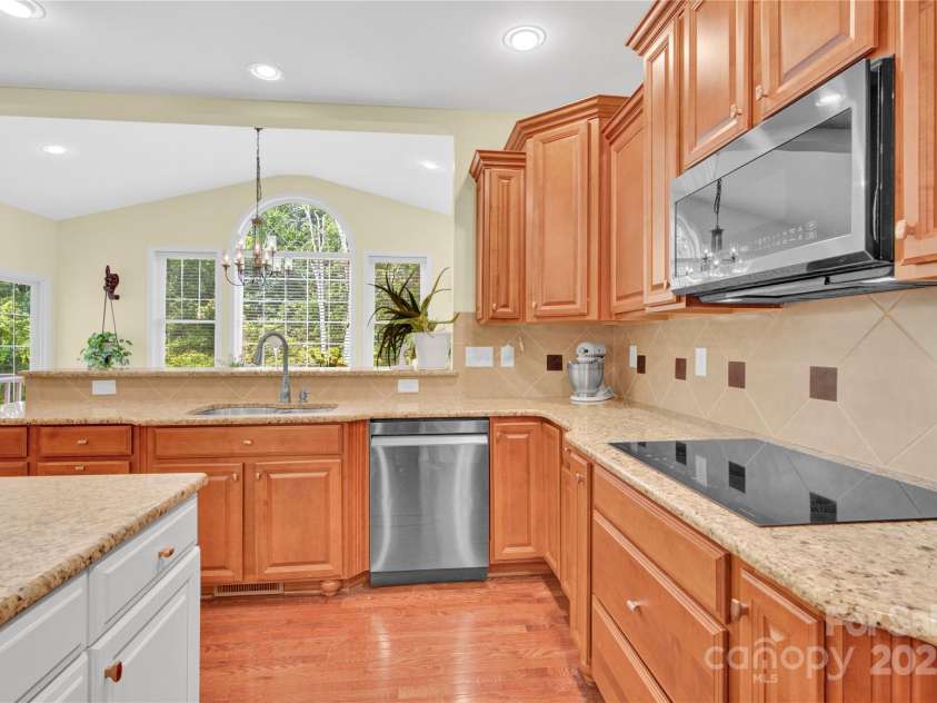 7480 Katelyn Court, Harrisburg, NC 28075.  MLS# CAR4263939, YatesRealty ID 22585. Kitchen with induction stove top