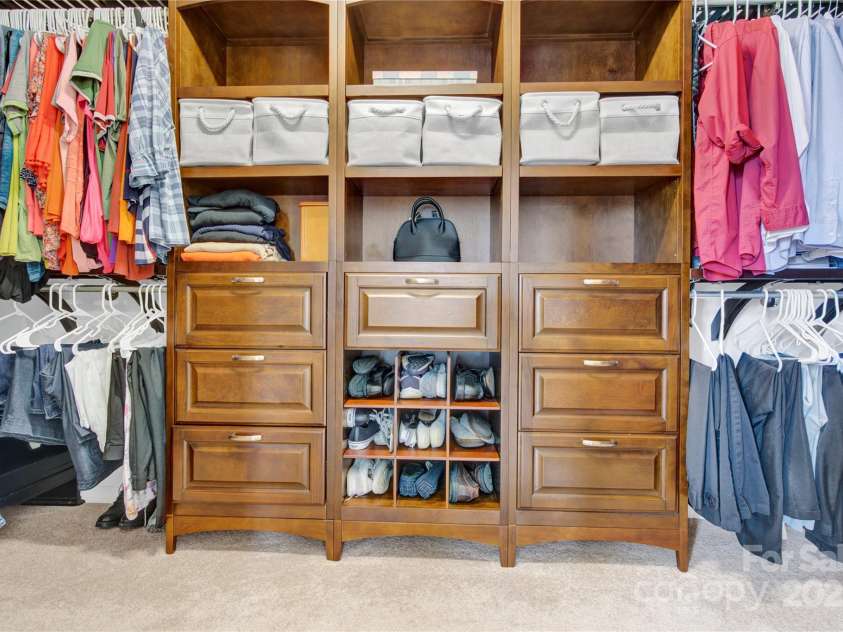 7480 Katelyn Court, Harrisburg, NC 28075.  MLS# CAR4263939, YatesRealty ID 22585. Primary Walk-in Closet with built-in system