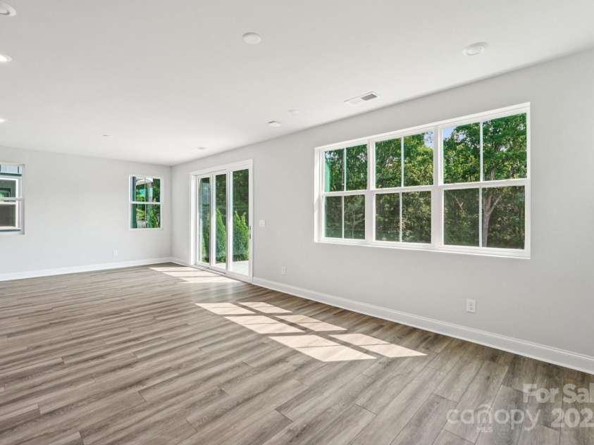 720 Flare Drive, Tega Cay, SC 29708.  MLS# CAR4267636, YatesRealty ID 22587. Great room view to dining