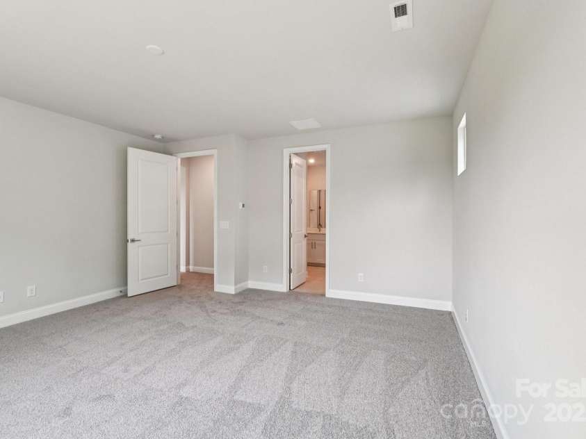 720 Flare Drive, Tega Cay, SC 29708.  MLS# CAR4267636, YatesRealty ID 22587. Primary Bedroom