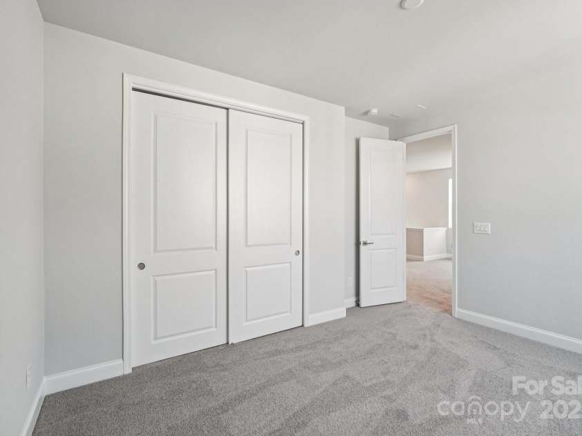 720 Flare Drive, Tega Cay, SC 29708.  MLS# CAR4267636, YatesRealty ID 22587. Secondary Bedroom