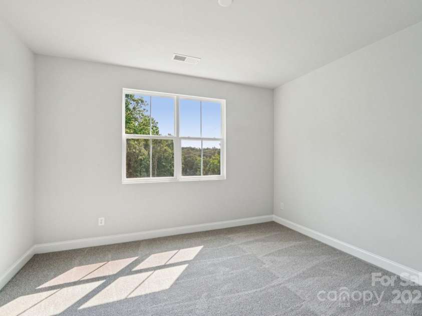 720 Flare Drive, Tega Cay, SC 29708.  MLS# CAR4267636, YatesRealty ID 22587. Secondary Bedroom