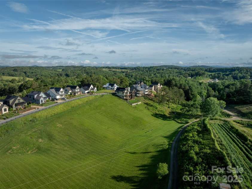 231 Westridge Farm Drive, Asheville, NC 28804.  MLS# CAR4265956, YatesRealty ID 22588. Aerial of neighborhood/street