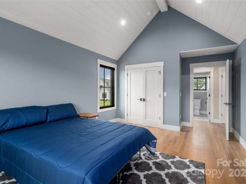 231 Westridge Farm Drive, Asheville, NC 28804.  MLS# CAR4265956, YatesRealty ID 22588. Bedroom with vaulted ceilings