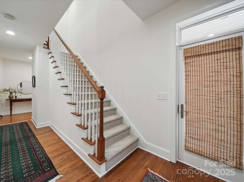 4644 Snow Drive, Harrisburg, NC 28075.  MLS# CAR4268049, YatesRealty ID 22589. Stairs to the 2nd wing of this stunning home.