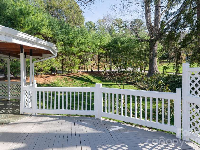 25 Blackwood Road, Asheville, NC 28804.  MLS# CAR4362662, YatesRealty ID 22590. Back deck