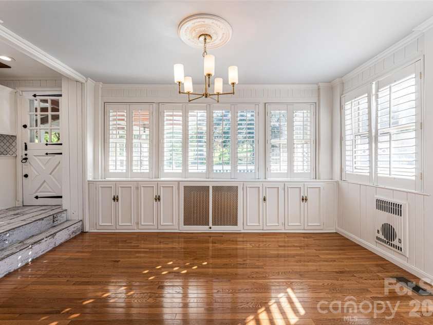 25 Blackwood Road, Asheville, NC 28804.  MLS# CAR4362662, YatesRealty ID 22590. Forming dining room with deck access