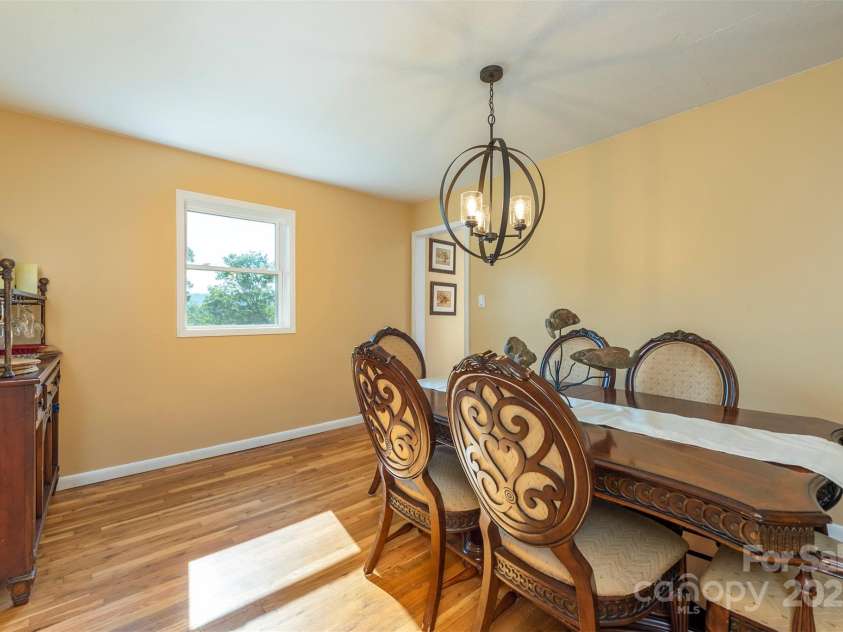 39 Pershing Road, Asheville, NC 28805.  MLS# CAR4262949, YatesRealty ID 22596. Dining room off the kitchen
