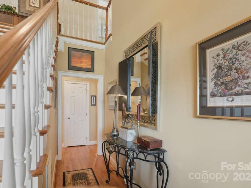 1004 Brockman Road, Greer, SC 29651.  MLS# CAR4312063, YatesRealty ID 226. 1004 - Foyer Hall to  Main Suite and Other Rooms