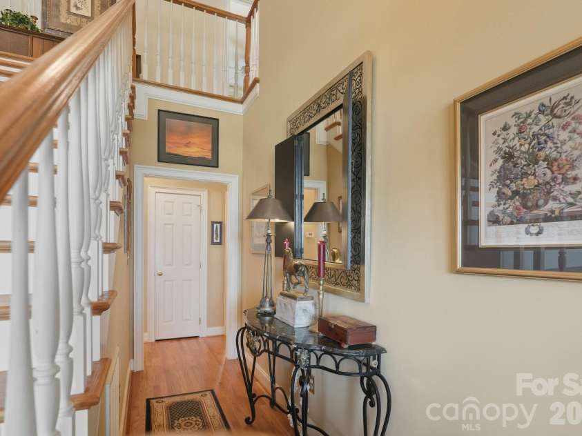 1004 Brockman Road, Greer, SC 29651.  MLS# CAR4312063, YatesRealty ID 226. 1004 - Foyer Hall to  Main Suite and Other Rooms
